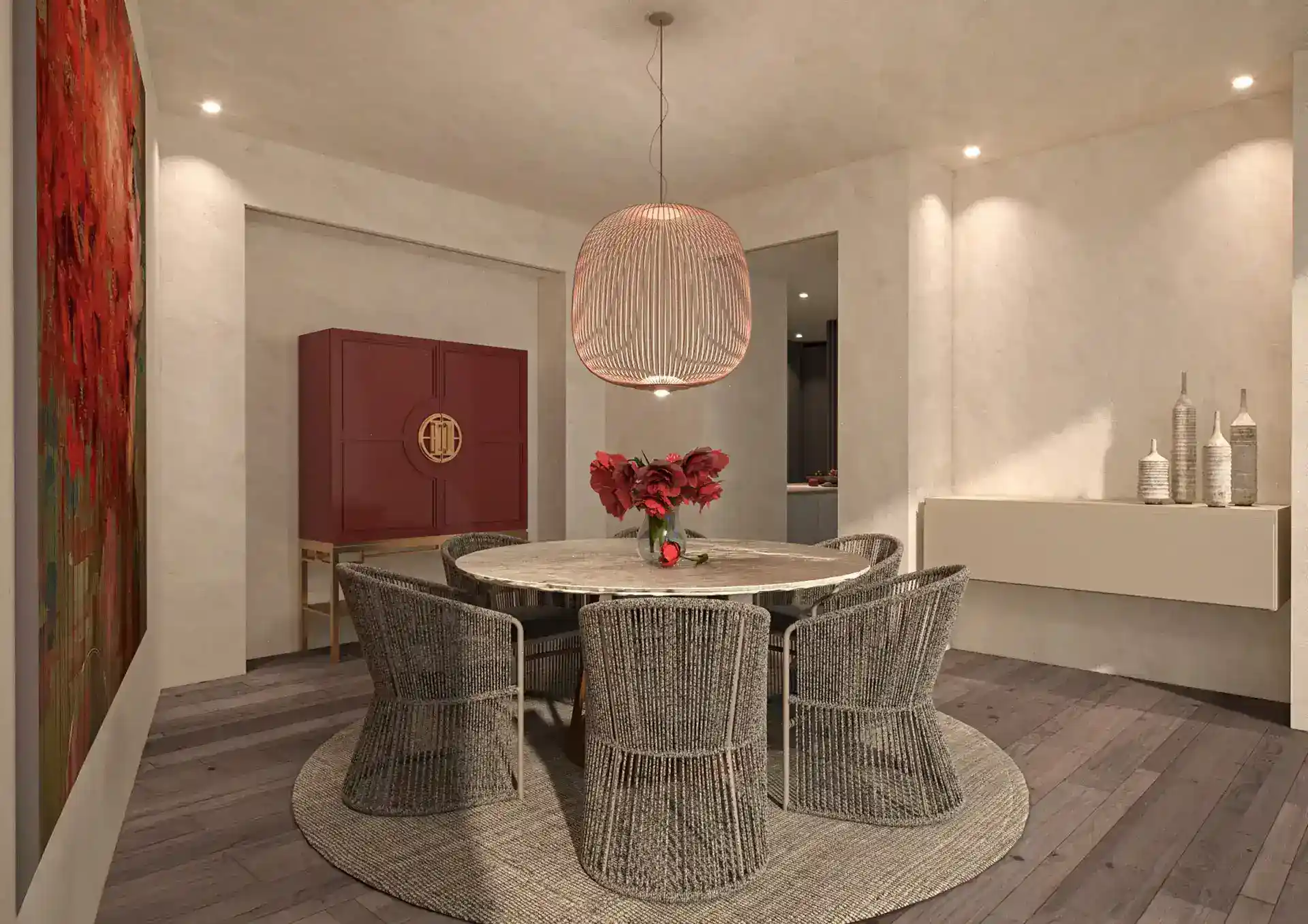 Dining table detail under a sculptural pendant light